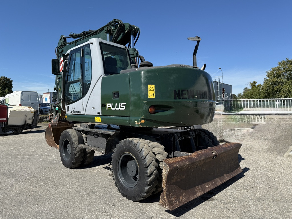 New Holland MH-Plus (111695) - Колесен багер: снимка 4 New Holland MH-Plus (111695) - Колесен багер: снимка 4