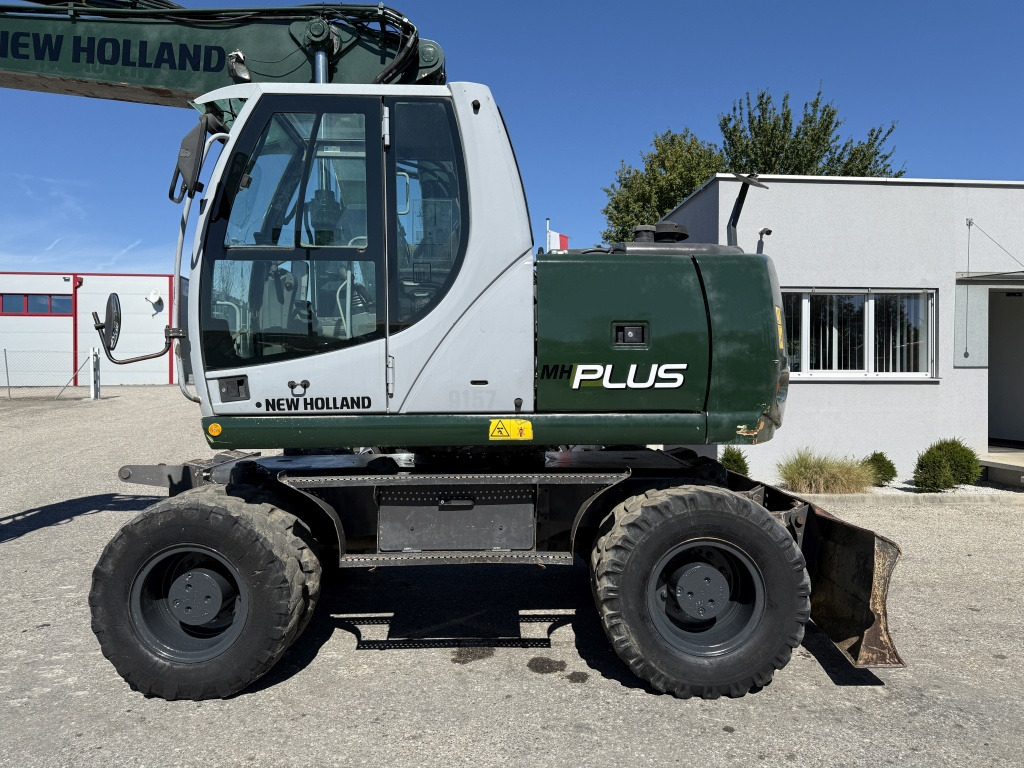 New Holland MH-Plus (111695) - Колесен багер: снимка 2 New Holland MH-Plus (111695) - Колесен багер: снимка 2