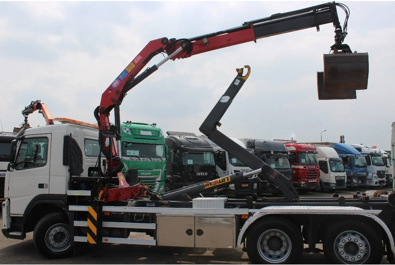 Volvo FM 330 + HMF 1035 + HOOKSYTEM HYVA + EURO 5 + 6X2 - Камион с кабелна система, Камион с кран: снимка 4 Volvo FM 330 + HMF 1035 + HOOKSYTEM HYVA + EURO 5 + 6X2 - Камион с кабелна система, Камион с кран: снимка 4