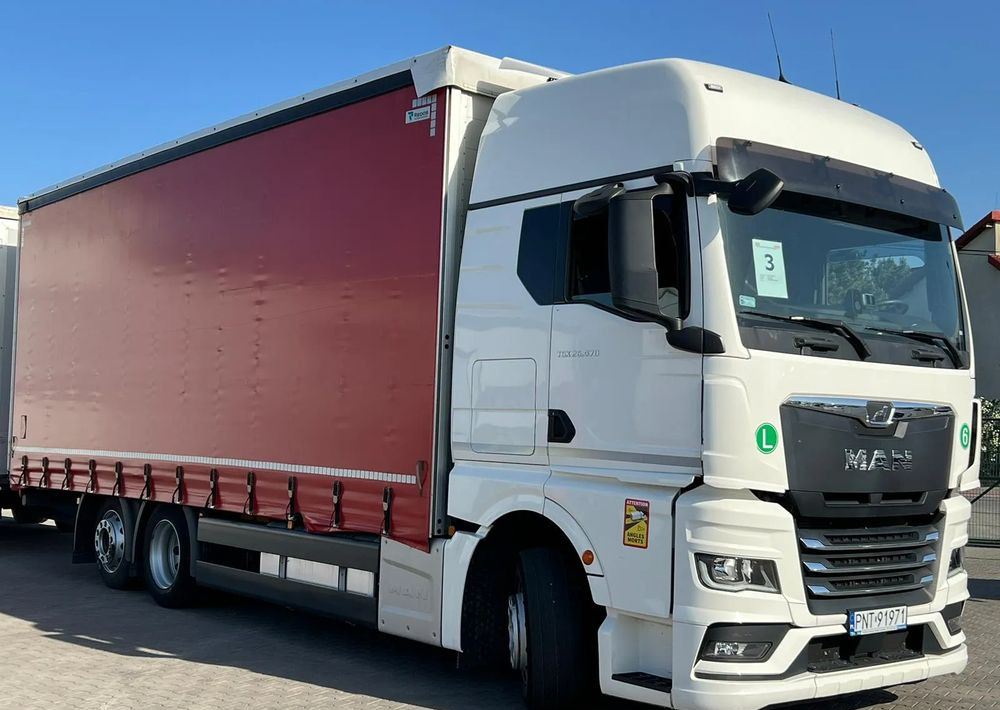 MAN TGX 26.470 z przyczepą Redos - Камион с брезент: снимка 3 MAN TGX 26.470 z przyczepą Redos - Камион с брезент: снимка 3