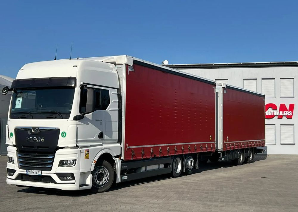 MAN TGX 26.470 z przyczepą Redos - Камион с брезент, Брезентово ремарке: снимка 1 MAN TGX 26.470 z przyczepą Redos - Камион с брезент, Брезентово ремарке: снимка 1