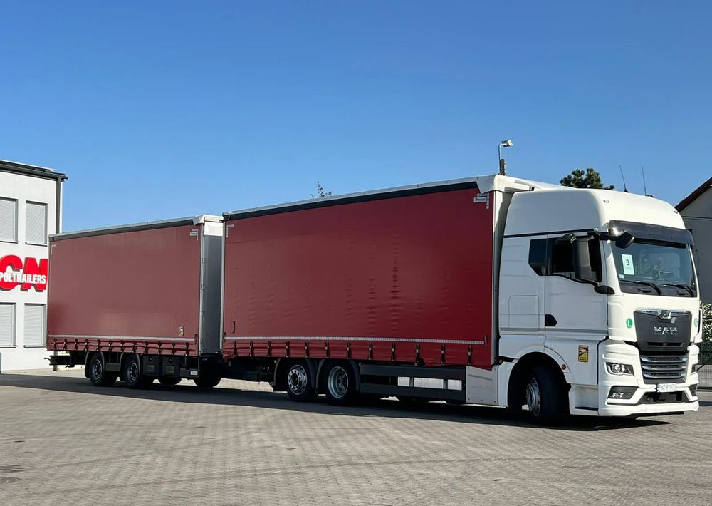 MAN TGX 26.470 z przyczepą Redos - Камион с брезент: снимка 2 MAN TGX 26.470 z przyczepą Redos - Камион с брезент: снимка 2