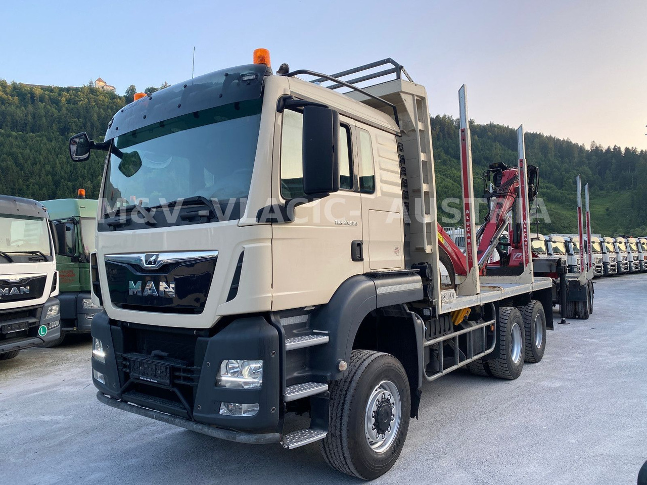 MAN 33.500 6X6 mit Kran PENZ 12Z - Камион за дърва, Камион с кран: снимка 1 MAN 33.500 6X6 mit Kran PENZ 12Z - Камион за дърва, Камион с кран: снимка 1