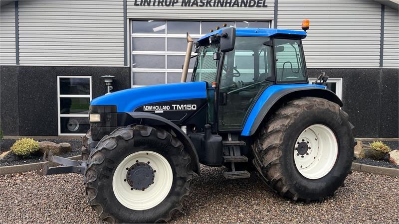 New Holland TM150 Med frontlift - Трактор: снимка 1 New Holland TM150 Med frontlift - Трактор: снимка 1