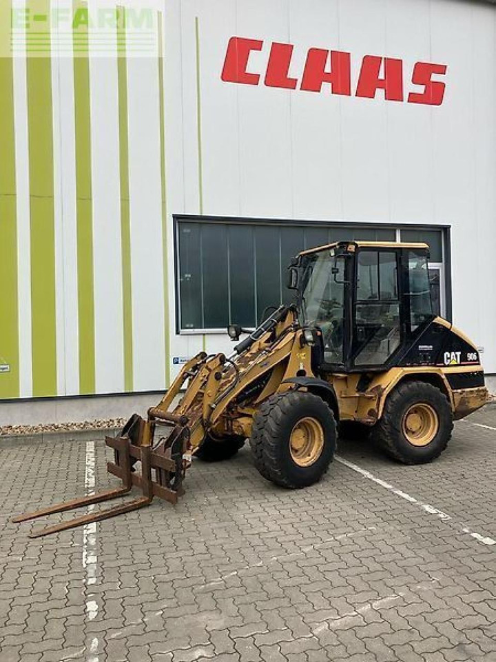 Caterpillar 906 - Мини багер: снимка 1 Caterpillar 906 - Мини багер: снимка 1
