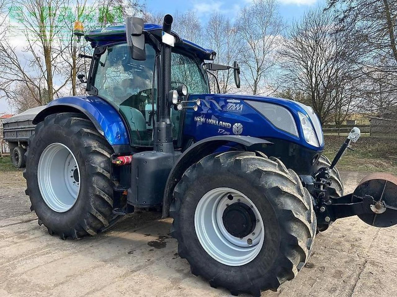 New Holland t 7.210 ac traktor stufenlos blue power auto command - Трактор: снимка 2 New Holland t 7.210 ac traktor stufenlos blue power auto command - Трактор: снимка 2