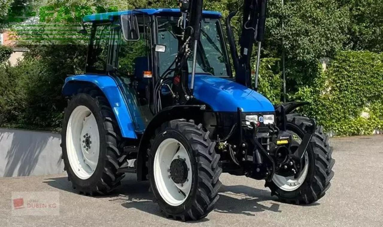 New Holland tl100 (4wd) - Трактор: снимка 3 New Holland tl100 (4wd) - Трактор: снимка 3
