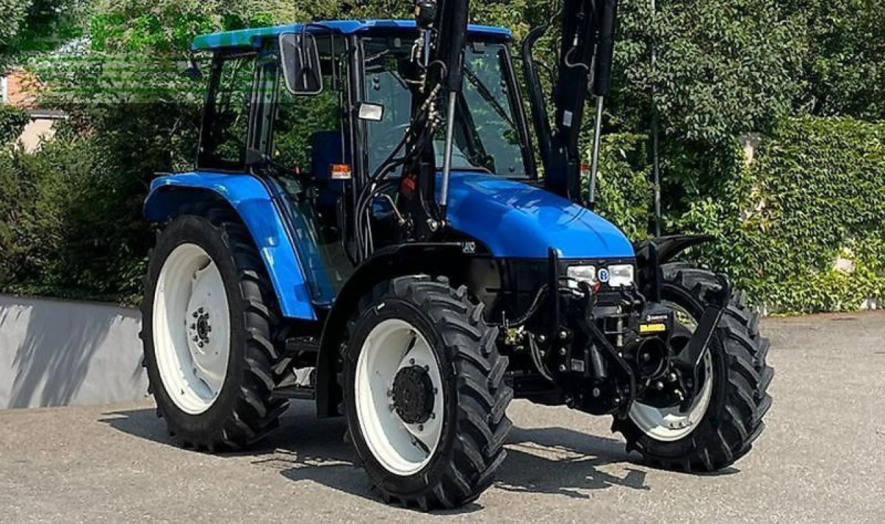 New Holland tl100 (4wd) - Трактор: снимка 3 New Holland tl100 (4wd) - Трактор: снимка 3