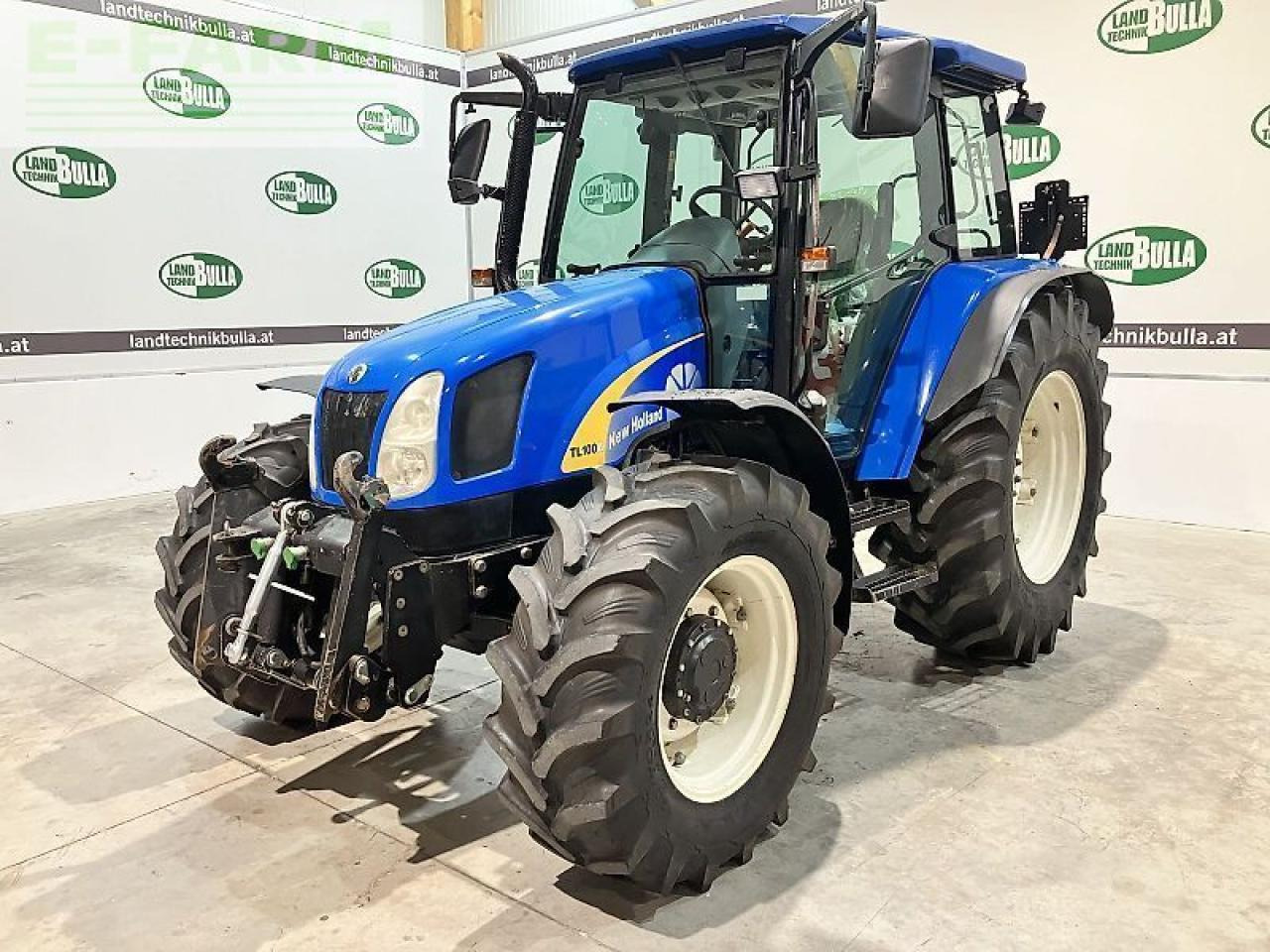 New Holland tl100a (4wd) A - Трактор: снимка 1 New Holland tl100a (4wd) A - Трактор: снимка 1