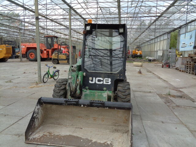 Мини челен товарач JCB 135 R: снимка 18