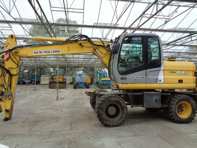 New Holland MH 4.6 - Колесен багер: снимка 1 New Holland MH 4.6 - Колесен багер: снимка 1