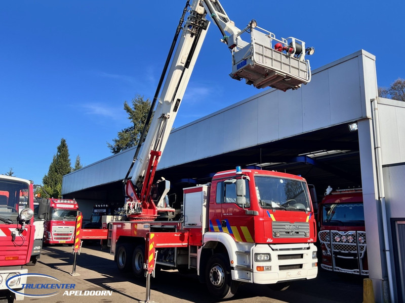 MAN TGA 26.350 Magirus ALP 320L = 32 meter, Waterpump, 6x4, Steel springs - Пожарна кола: снимка 2 MAN TGA 26.350 Magirus ALP 320L = 32 meter, Waterpump, 6x4, Steel springs - Пожарна кола: снимка 2