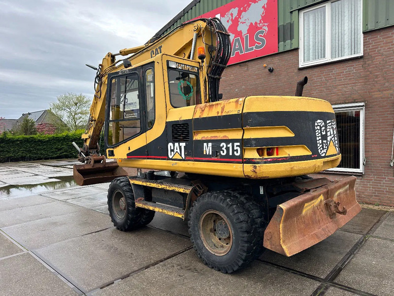 Caterpillar M315 +ROTO CE - Колесен багер: снимка 4 Caterpillar M315 +ROTO CE - Колесен багер: снимка 4