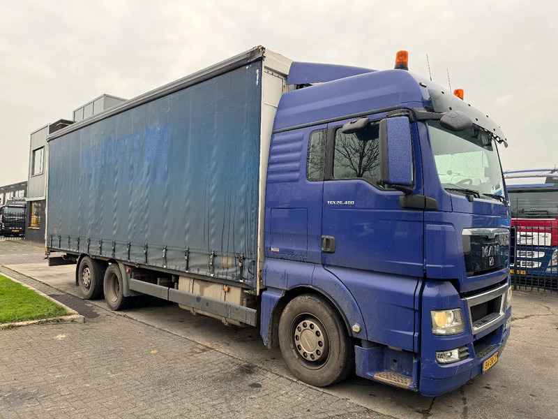 MAN TGX 26.400 6X2 - EURO 4 + LIFT + STEERING AXLE + TÜV 10-2025 - Камион с брезент: снимка 3 MAN TGX 26.400 6X2 - EURO 4 + LIFT + STEERING AXLE + TÜV 10-2025 - Камион с брезент: снимка 3