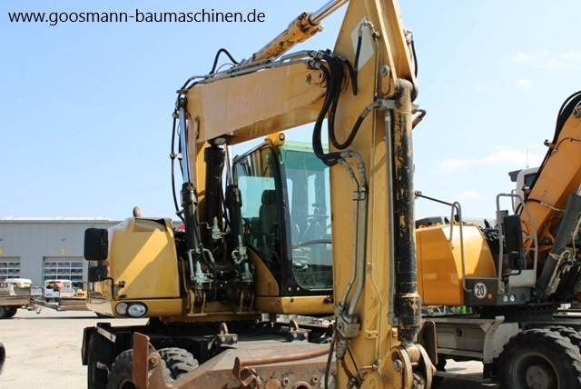 CAT M 315D - Колесен багер: снимка 5 CAT M 315D - Колесен багер: снимка 5