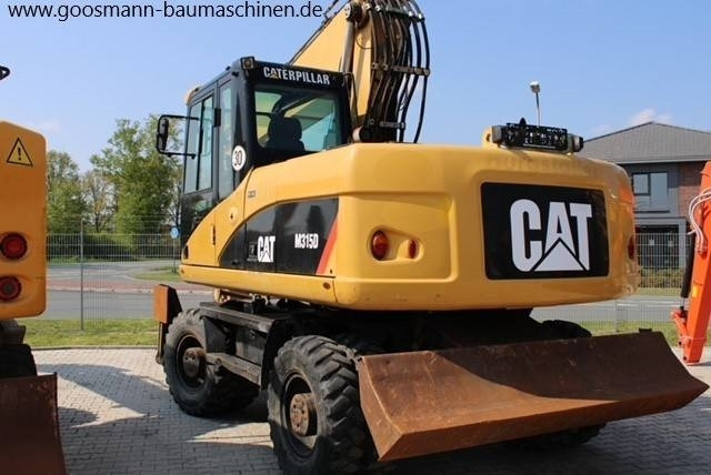 CAT M 315D - Колесен багер: снимка 2 CAT M 315D - Колесен багер: снимка 2