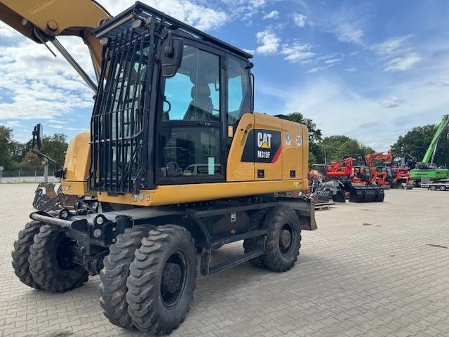 CAT M 318F - Колесен багер: снимка 1 CAT M 318F - Колесен багер: снимка 1