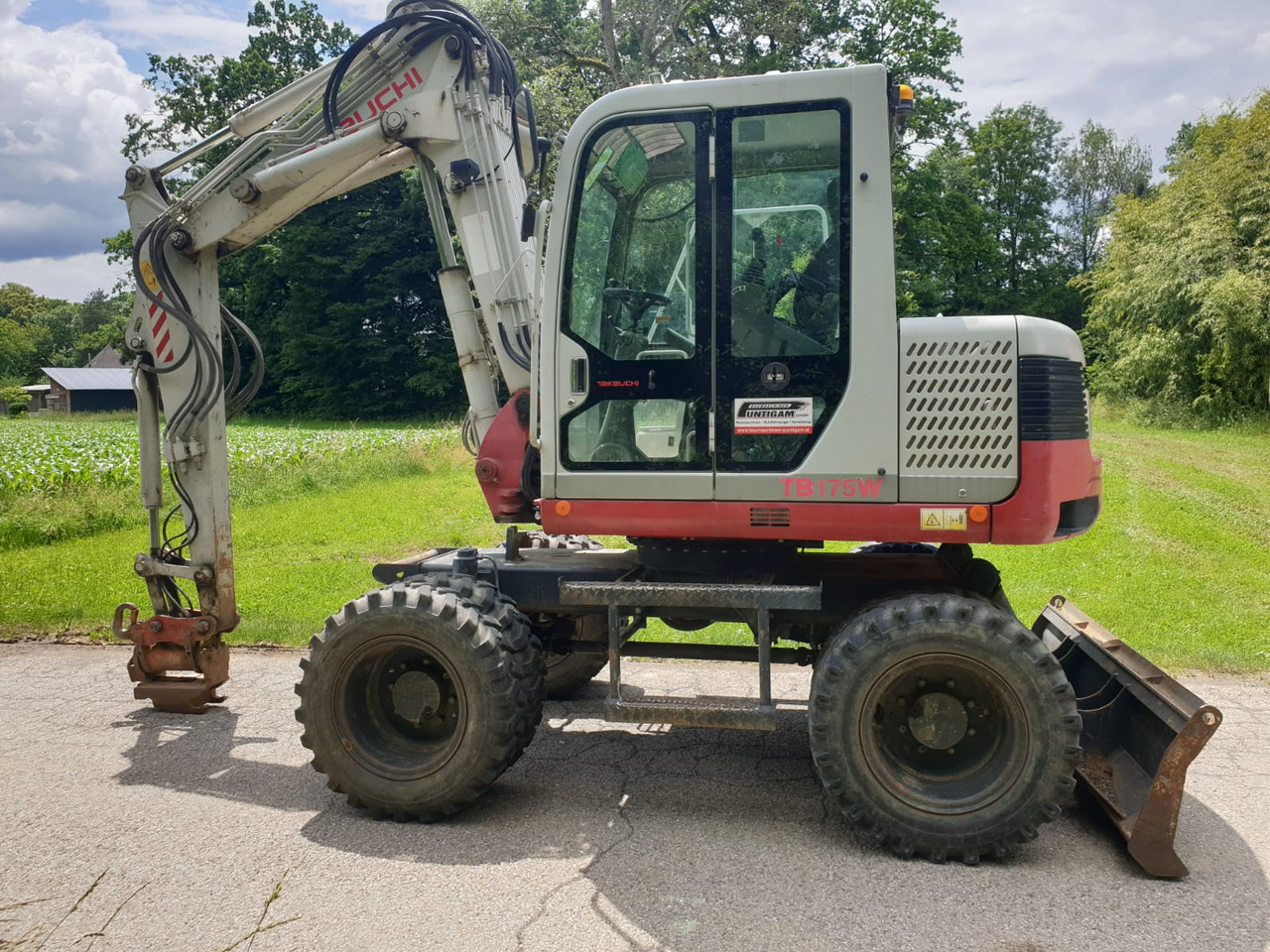 TAKEUCHI TB 175W - Колесен багер: снимка 1 TAKEUCHI TB 175W - Колесен багер: снимка 1