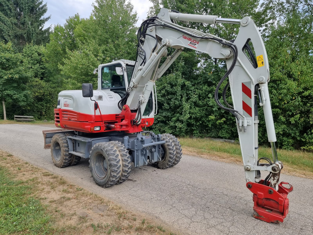 Takeuchi TB 295 W - Колесен багер: снимка 4 Takeuchi TB 295 W - Колесен багер: снимка 4