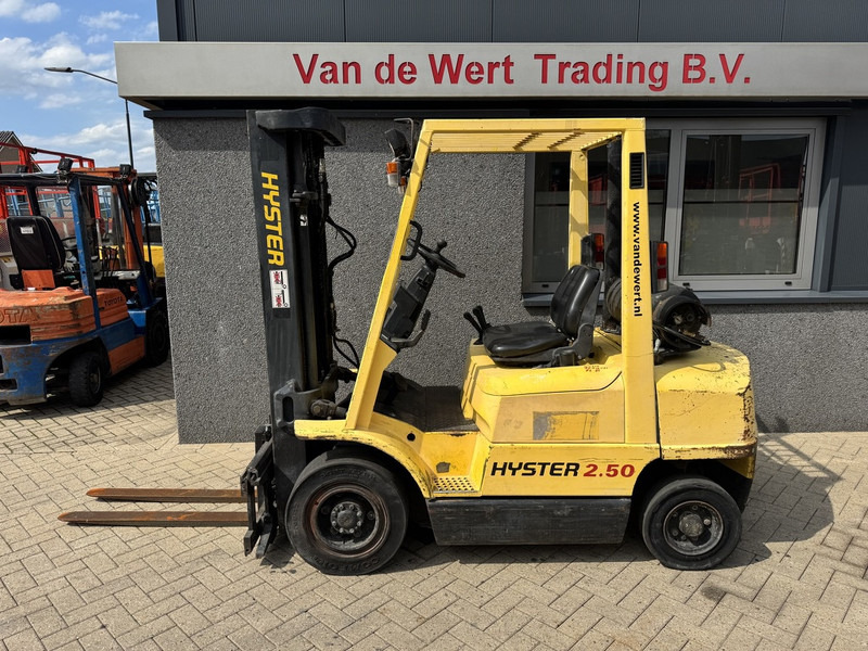 Hyster H2.50XM Triplo 470 Freelift / Sideshift LPG 1995 - Газокар: снимка 1 Hyster H2.50XM Triplo 470 Freelift / Sideshift LPG 1995 - Газокар: снимка 1