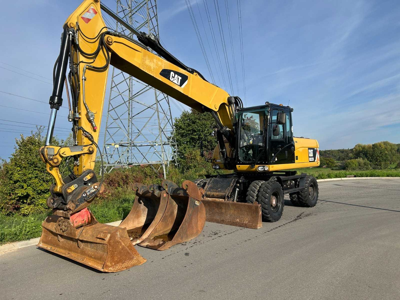 Caterpillar M 322 D - Колесен багер: снимка 1 Caterpillar M 322 D - Колесен багер: снимка 1