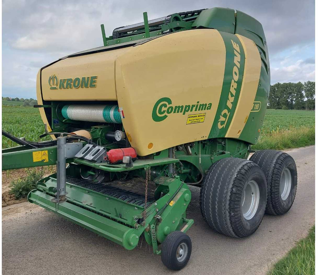 Krone Comprima V 180 - Рулонна сламопреса: снимка 1 Krone Comprima V 180 - Рулонна сламопреса: снимка 1