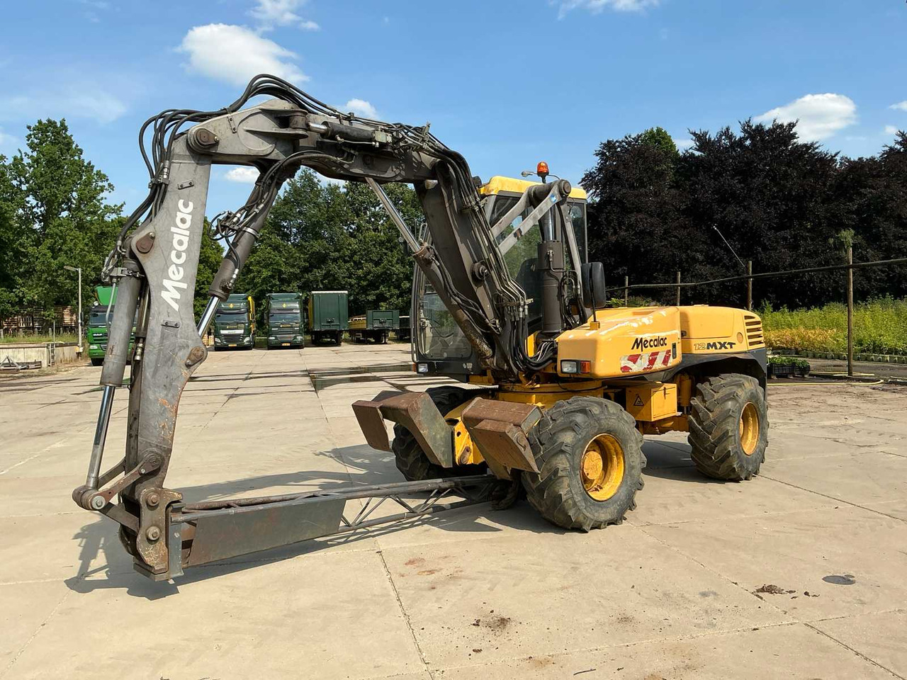 Mecalac 12MXT - Багер-товарач: снимка 1 Mecalac 12MXT - Багер-товарач: снимка 1