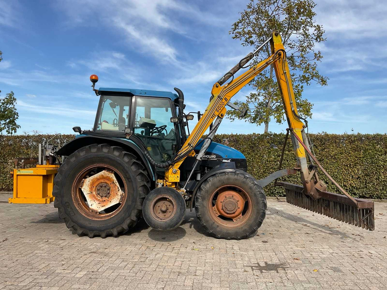 New Holland TS100 - Трактор: снимка 4 New Holland TS100 - Трактор: снимка 4