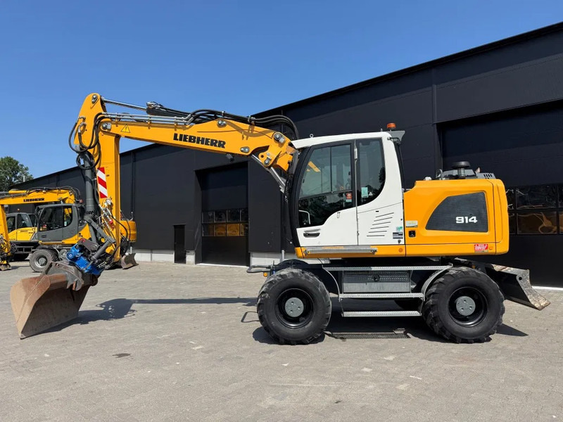 Liebherr A914 2019 7300 uur !! NL MACHINE !! - Колесен багер: снимка 1 Liebherr A914 2019 7300 uur !! NL MACHINE !! - Колесен багер: снимка 1
