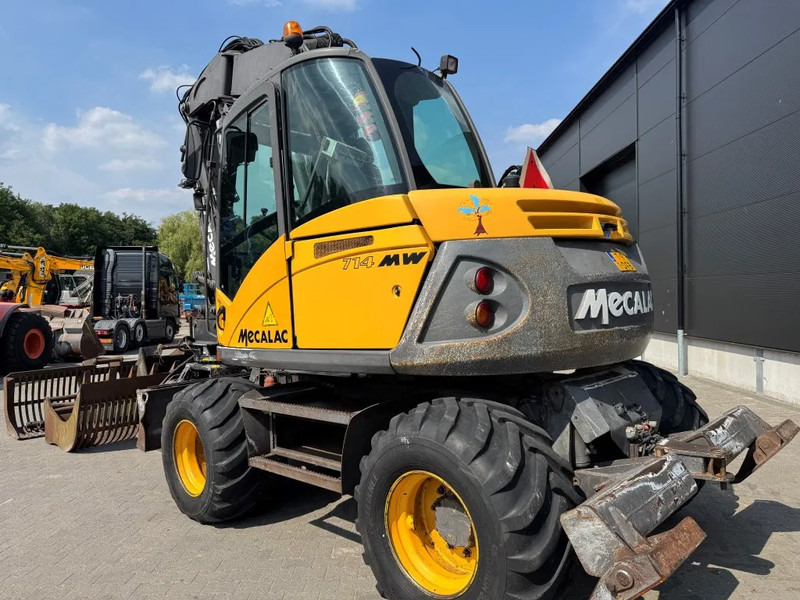 Mecalac 714MW FULL ATTACHMENTS OVERCOMPLEET !!! - Колесен багер: снимка 4 Mecalac 714MW FULL ATTACHMENTS OVERCOMPLEET !!! - Колесен багер: снимка 4