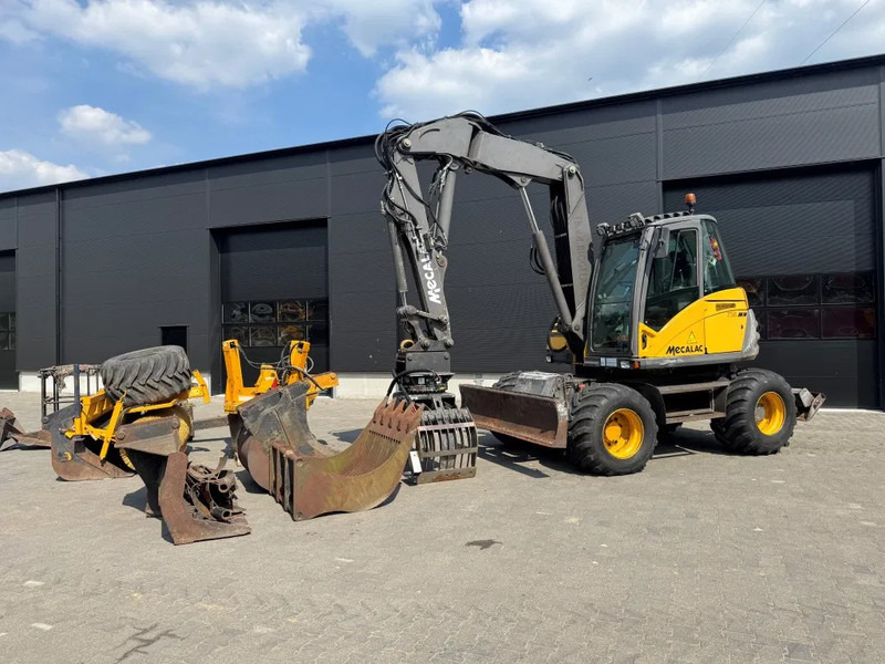 Mecalac 714MW FULL ATTACHMENTS OVERCOMPLEET !!! - Колесен багер: снимка 2 Mecalac 714MW FULL ATTACHMENTS OVERCOMPLEET !!! - Колесен багер: снимка 2