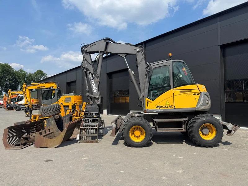 Mecalac 714MW FULL ATTACHMENTS OVERCOMPLEET !!! - Колесен багер: снимка 1 Mecalac 714MW FULL ATTACHMENTS OVERCOMPLEET !!! - Колесен багер: снимка 1