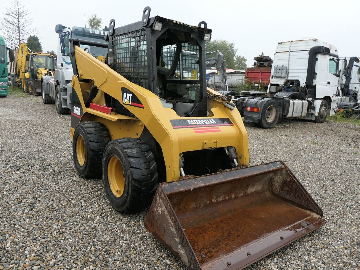 Caterpillar 262 B - Мини челен товарач: снимка 1 Caterpillar 262 B - Мини челен товарач: снимка 1