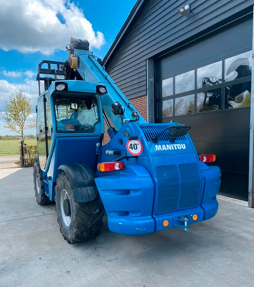 Manitou MHT 780 - Телескопичен колесен товарач: снимка 4 Manitou MHT 780 - Телескопичен колесен товарач: снимка 4