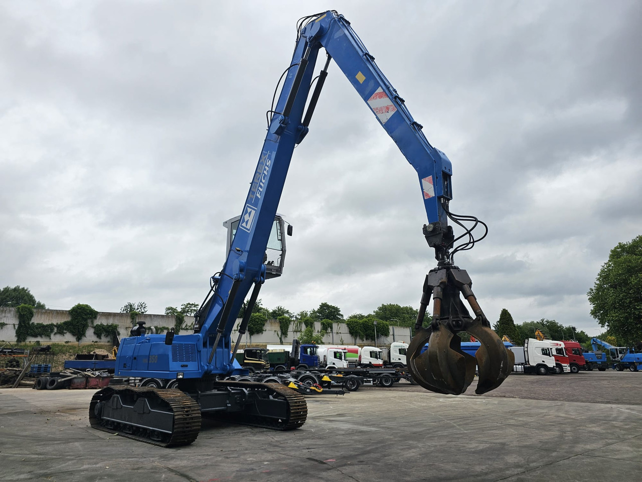 Fuchs RHL 350 Materialhandler With Adjustable Tracks - Багер за манипулиране на материали: снимка 5 Fuchs RHL 350 Materialhandler With Adjustable Tracks - Багер за манипулиране на материали: снимка 5