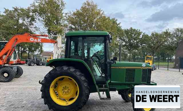 John Deere 6100 - Трактор: снимка 4 John Deere 6100 - Трактор: снимка 4