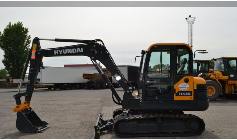 Hyundai HX55 Mini lánctalpas forgókotró - Мини багер: снимка 5 Hyundai HX55 Mini lánctalpas forgókotró - Мини багер: снимка 5