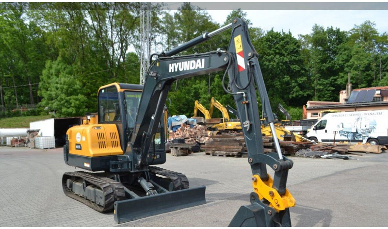 Hyundai HX55 Mini lánctalpas forgókotró - Мини багер: снимка 1 Hyundai HX55 Mini lánctalpas forgókotró - Мини багер: снимка 1