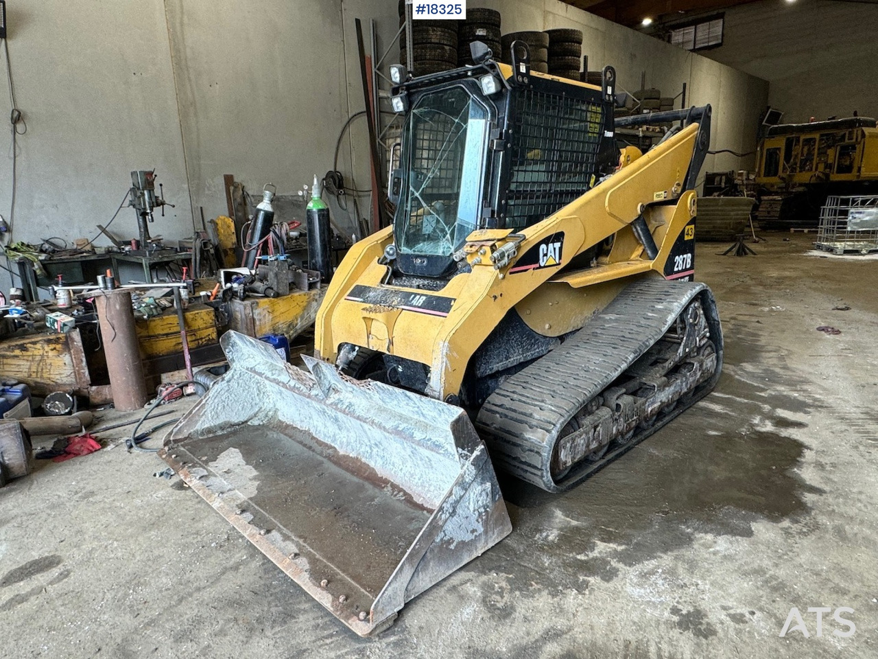 Мини челен товарач Caterpillar 287B: снимка 1