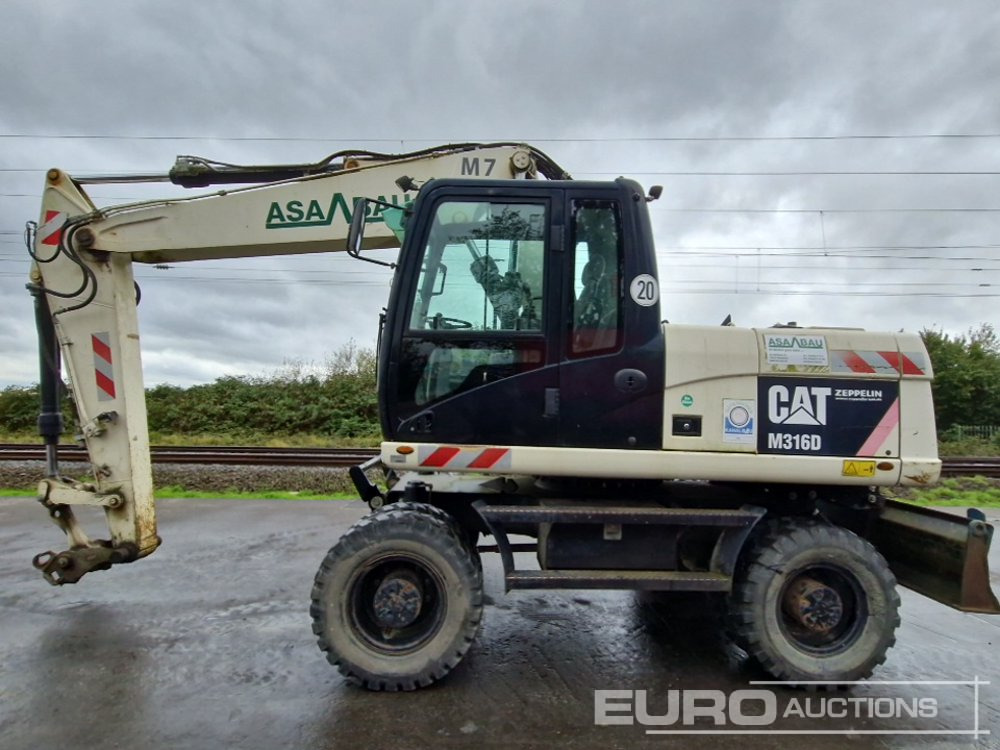 2011 CAT M316D - Колесен багер: снимка 2 2011 CAT M316D - Колесен багер: снимка 2