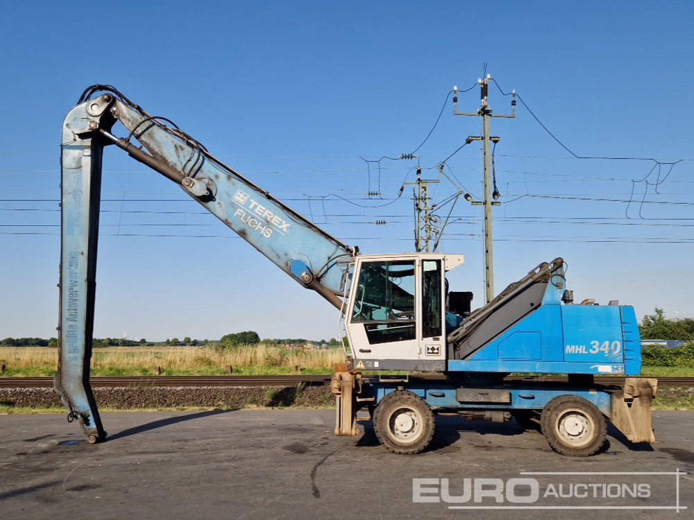 2011 Fuchs MHL340D - Колесен багер: снимка 2 2011 Fuchs MHL340D - Колесен багер: снимка 2