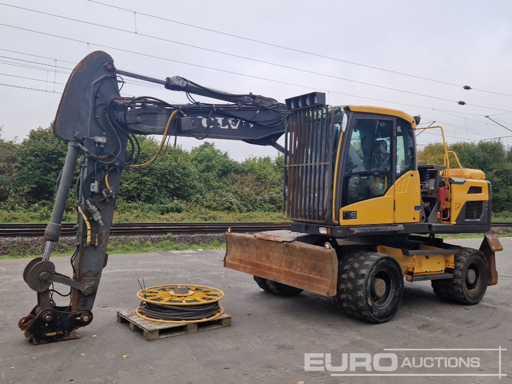 2012 Volvo EW140D - Колесен багер: снимка 1 2012 Volvo EW140D - Колесен багер: снимка 1
