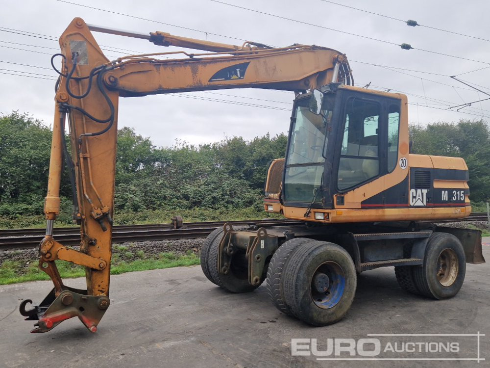 CAT M315 - Колесен багер: снимка 1 CAT M315 - Колесен багер: снимка 1