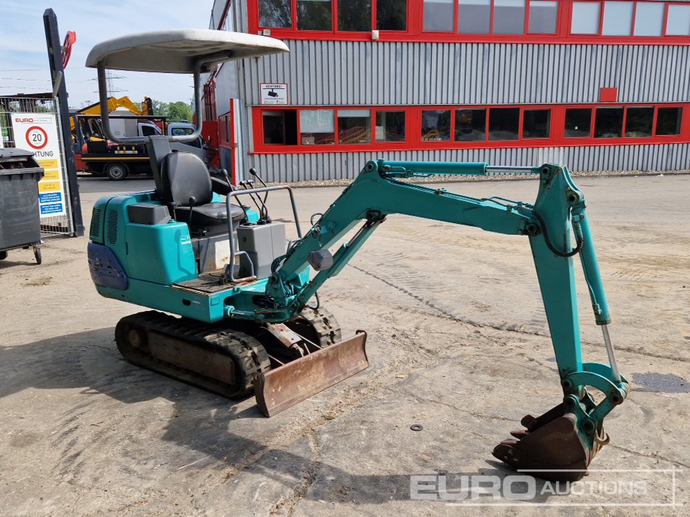 Мини багер Komatsu PC05-7: снимка 7