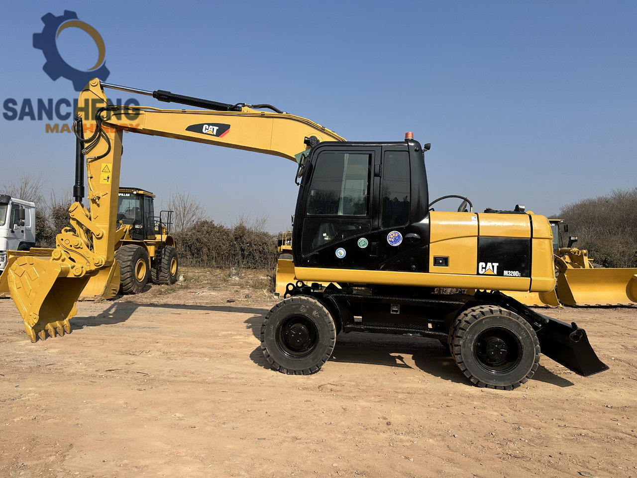 CATERPILLAR M320D2 - Колесен багер: снимка 2 CATERPILLAR M320D2 - Колесен багер: снимка 2