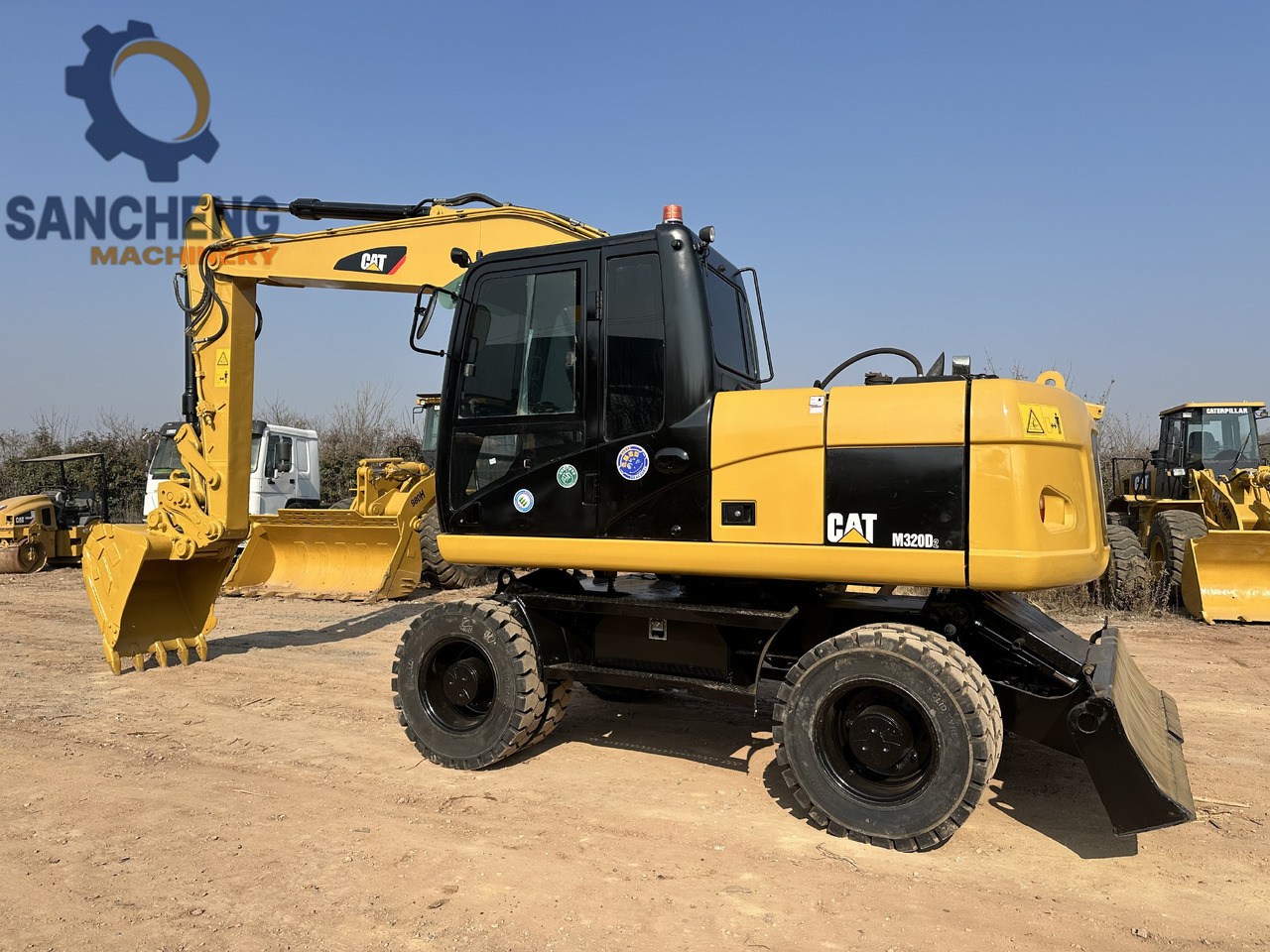 CATERPILLAR M320D2 - Колесен багер: снимка 1 CATERPILLAR M320D2 - Колесен багер: снимка 1