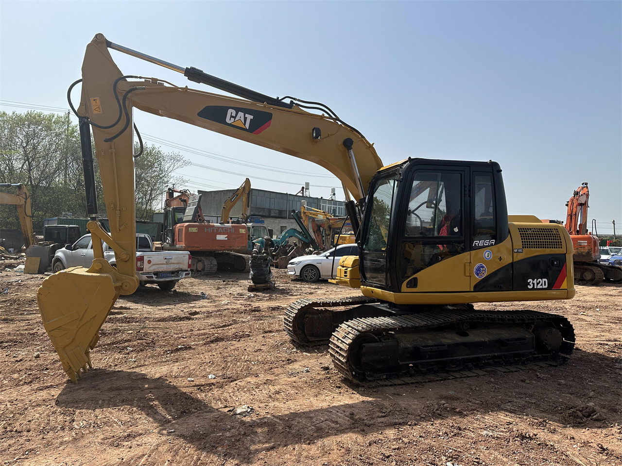 Caterpillar 312D - Мини багер: снимка 1 Caterpillar 312D - Мини багер: снимка 1