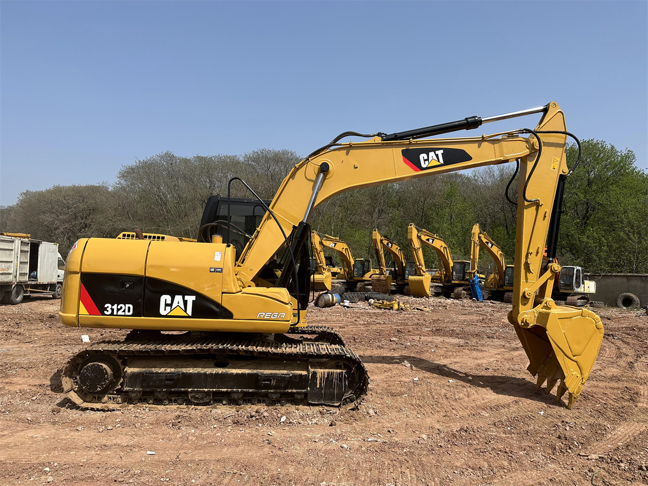 Caterpillar 312D - Мини багер: снимка 1 Caterpillar 312D - Мини багер: снимка 1