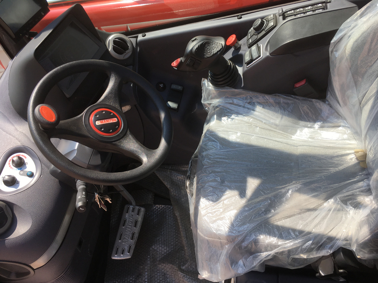 MANITOU MHT 10230 ST4 - 2018 - Телескопичен товарач: снимка 4 MANITOU MHT 10230 ST4 - 2018 - Телескопичен товарач: снимка 4