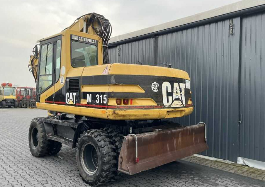CAT Lift Trucks M315 - Колесен багер: снимка 3 CAT Lift Trucks M315 - Колесен багер: снимка 3